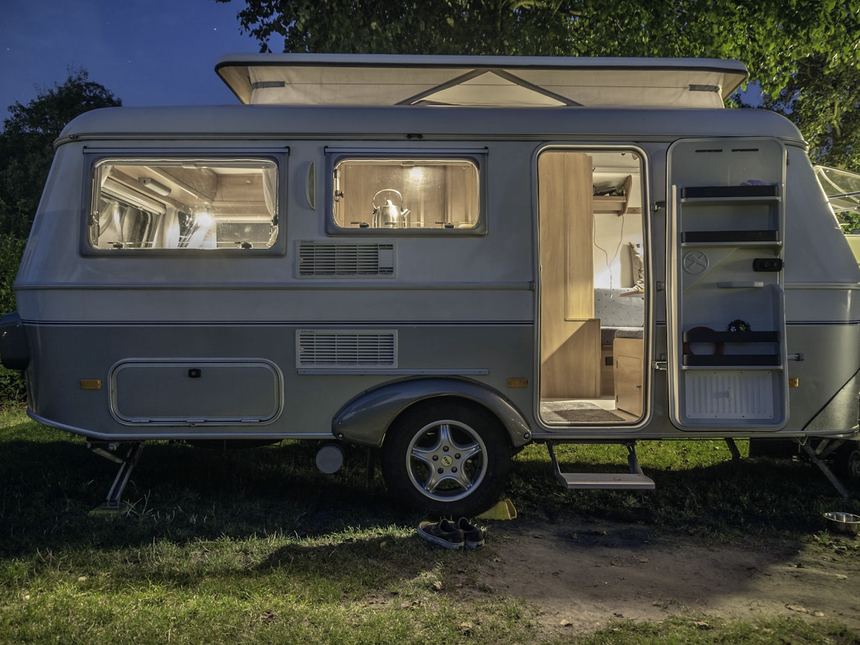 A caravan set up at a campsite